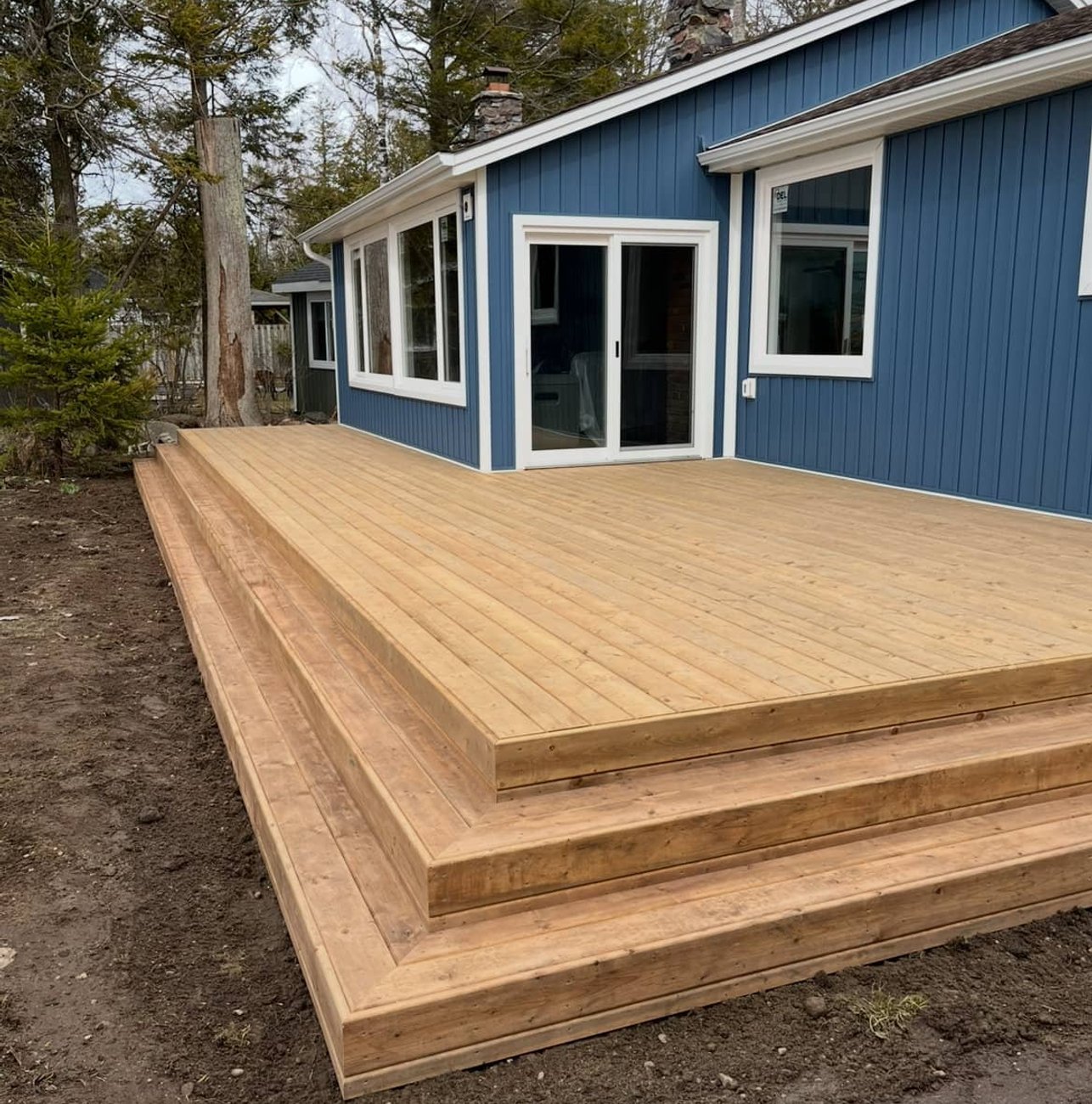 Large wood deck construction on Hamilton home