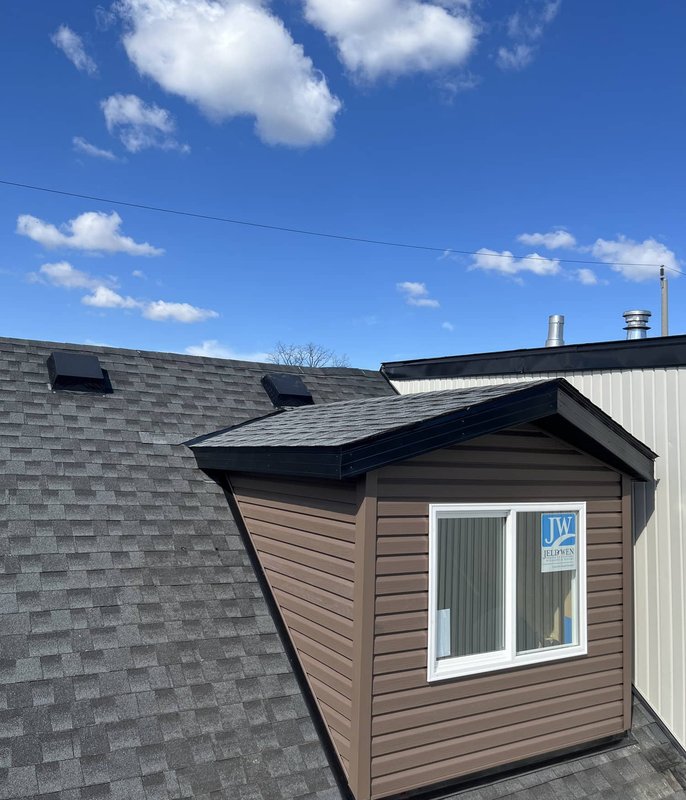 Dormer addition with new roof