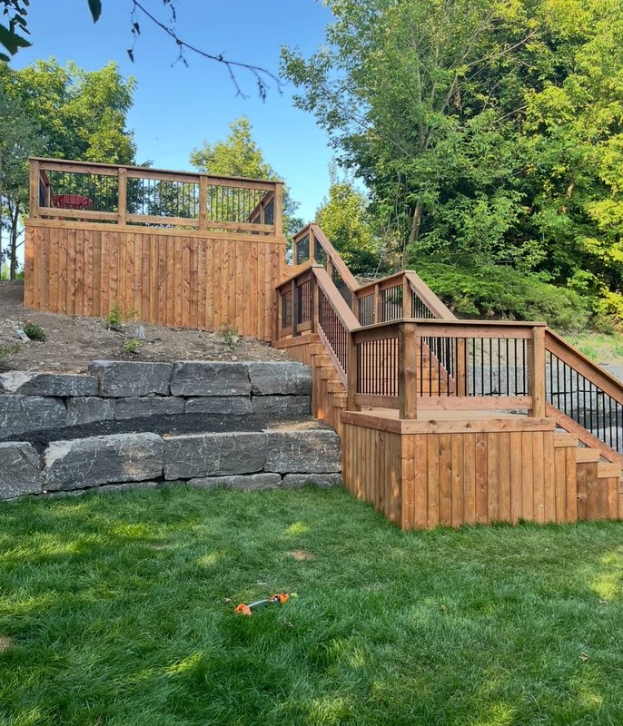 Cedar deck with stone retaining wall